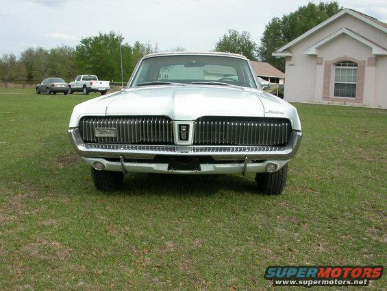 Front view of a 1968 Mercury Cougar with a prominent chrome grille