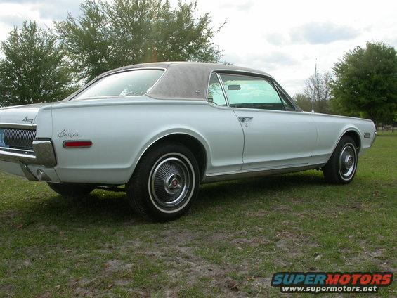 1968 Mercury Cougar parked on grass, rear three-quarter view