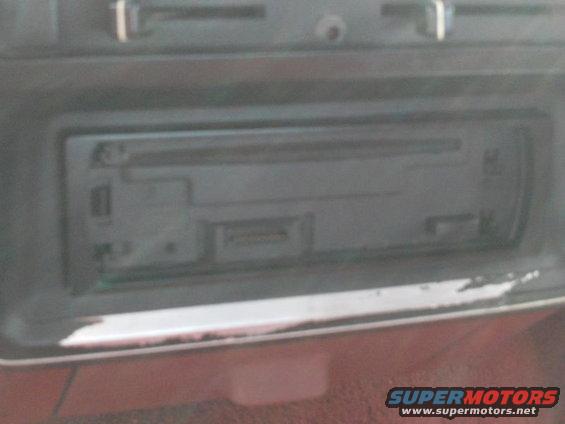 Car stereo unit with cassette deck and CD slot