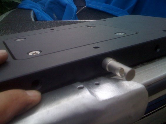Close-up of black trolling motor mount with silver pin