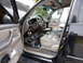 2002 Toyota Sequoia - The interior of a vehicle is shown with the dashboard and center console removed for repairs.