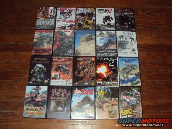 Collection of off-road vehicle DVDs on a wooden floor