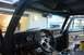 1979 Ford Bronco - Interior view of a 1979 Ford Bronco, an aftermarket steering wheel and additional gauges.