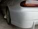 1994 Mazda MX-6 - Close-up of the rear of a silver 1994 Mazda MX-6, showing the taillight and wheel.