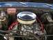 1979 Chevrolet C/K Pickup - The engine bay of a 1979 Chevrolet C/K Pickup, a chrome K&N air filter and a red MSD ignition box.