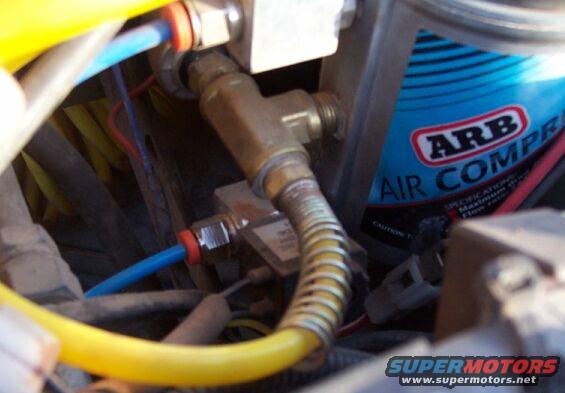 You can tee the center port of your ARB compressor with basic 1/4" NPT stuff from the hardware store