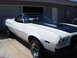 1973 Ford Ranchero - White 1973 Ford Ranchero with black hood stripes and a black vinyl top.