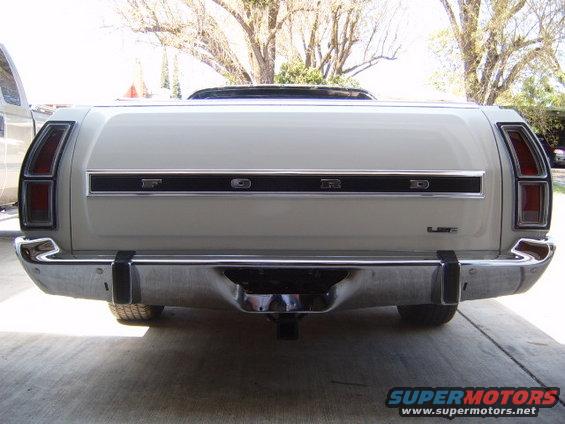 Rear view of a 1973 Ford Ranchero with chrome bumper and 'FORD' lettering across the tailgate