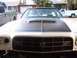 1973 Ford Ranchero - Front view of a 1973 Ford Ranchero, showing its distinctive grille and hood scoop.