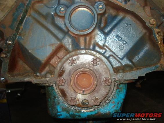 Engine block with casting marks and bolts