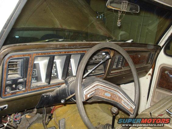 1979 Ford Bronco dashboard with woodgrain trim and gauges