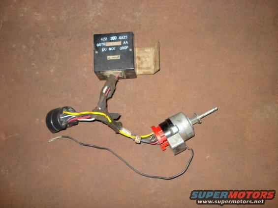 Ignition switch and relay with wiring harness. Black box has '422 260 4A25' and 'DO NOT DROP' printed on it
