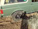 1989 Ford Bronco - This 1989 Ford Bronco is seen stuck in the mud with its off-road tires.