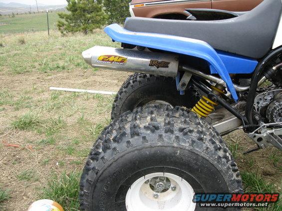 Blue ATV rear with FMF Power Core exhaust and Fox sticker