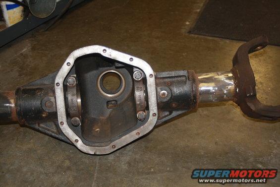 Differential axle housing with part numbers visible on internal components