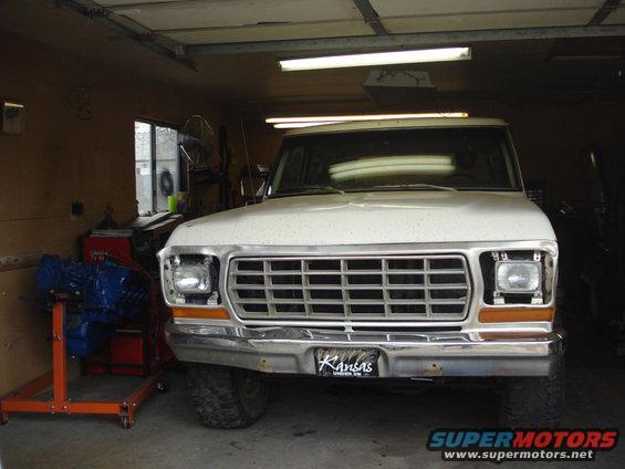 White 1979 Ford Bronco front view in garage, Kansas license plate visible