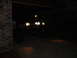 1984 Ford Bronco II - A 1984 Ford Bronco II is parked inside a garage with its headlights illuminated.
