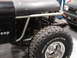 1979 Jeep CJ7 - This Jeep shows off its large Mud-Terrain T/A tires and a custom front end with the fender removed.