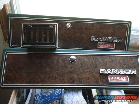 Two wood-grain dashboard trim panels with "RANGER LARIAT" badging