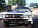 1973 Ford Ranchero - The front of a white 1972 Ford Ranchero shows a prominent grille and dual headlights.