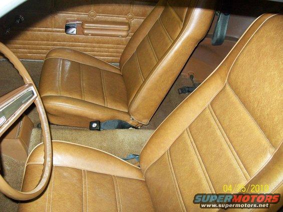 Brown vinyl bucket seats and door panel in a 1972 Ford Mustang