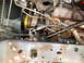 1996 Ford Bronco - This image shows various engine components and part of the vehicle's frame, not a specific year or model.