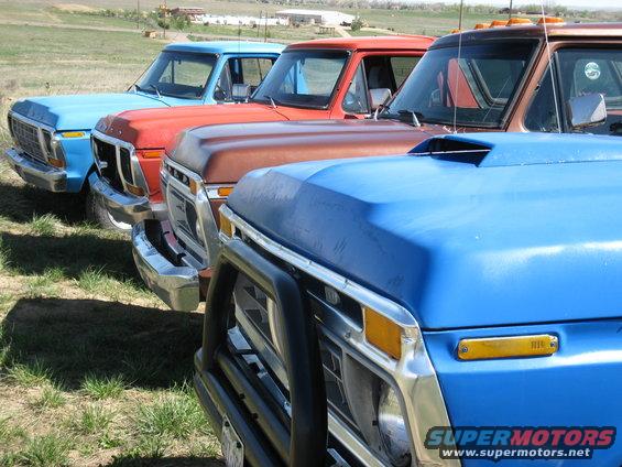 Blue pickup truck front grille and hood with scoop