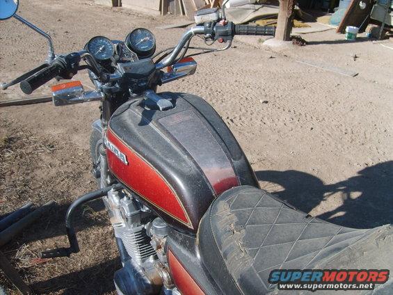 1979 Honda CB750 motorcycle, red and black tank, diamond-stitched seat