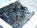 2003 Ford Crown Victoria - The engine bay of a 2003 Ford Crown Victoria, an aftermarket air intake system and a clean engine compartment.
