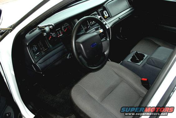 1998 Ford Crown Victoria interior showing dashboard, steering wheel, and front seats