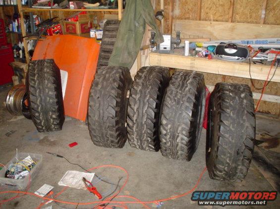 dsc00245.jpg Hummer tires, with 9-10" 2x4 peices in them to make them used to being on a rim(kinda)