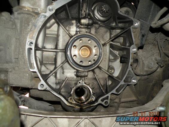 Engine component with oil residue and a central circular bearing assembly