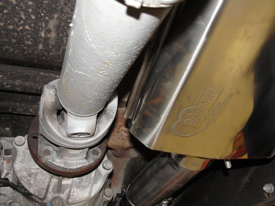Hooker Super Competition exhaust muffler with driveshaft and transfer case