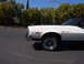 1973 Ford Ranchero - Front quarter view of a white 1973 Ford Ranchero 500 with a black vinyl top.