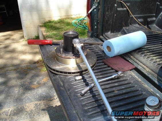 Brake rotor and hub assembly with a socket wrench on a truck bed