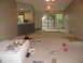 1983 Ford 427 - This room appears to be undergoing renovation, with a mattress and various supplies laid out on the carpeted floor.