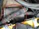 1993 Ford Bronco - Close-up view of engine components, including hoses and wiring, with a red circle highlighting a section.