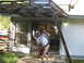 1983 Ford 427 - A man reacts with alarm as a wooden pergola appears to be collapsing over him.