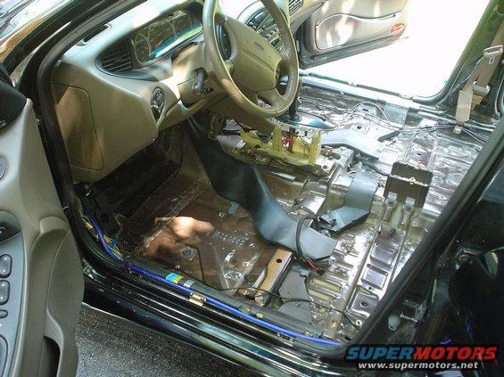 dsc00483.jpg Picture of the car gutted from the outside of the drivers door looking in.