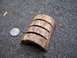 1971 Ford Ranchero - A quarter is placed next to a piece of wood that has been cut four times.