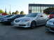 2003 Acura TL - Silver sedan parked in a lot with other vehicles. The car appears to be a 2004 model year.