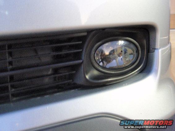 Silver 2003 Acura TL front bumper fog light