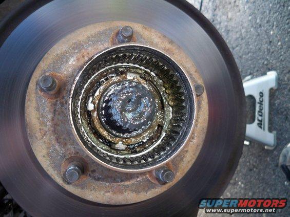 Right about now is when you'll need that handy (and expensive) 4-pronged bearing removal socket.