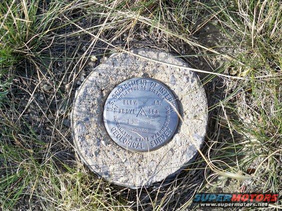 US Department of Interior marker with elevation and survey info, dated 1972