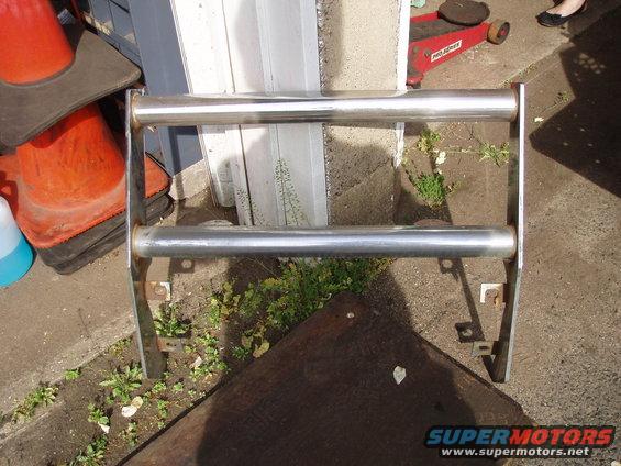 Chrome bull bar with two horizontal bars, mounted on brackets