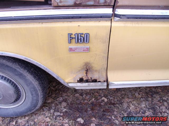 1976 Ford F-150 fender showing rust damage near the wheel well and 'F-150 Trailer Special' badging