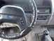 1994 Ford Explorer - The interior of a 1994 Ford Explorer, its steering wheel and manual transmission shifter.