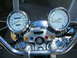 1992 Yamaha Virago - Close-up of a motorcycle's dashboard, showing the speedometer, tachometer, and indicator lights.