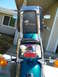 1992 Yamaha Virago - The back of a teal motorcycle is shown, a chrome luggage rack and a red taillight.
