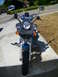 1992 Yamaha Virago - Front view of a blue 1992 Yamaha Virago motorcycle parked on a concrete driveway.